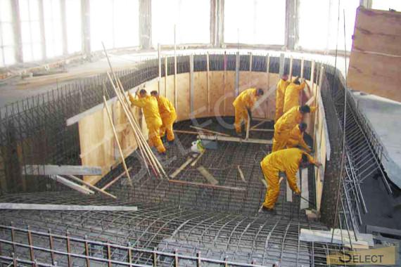 Filling and reinforcement of the pool bowl