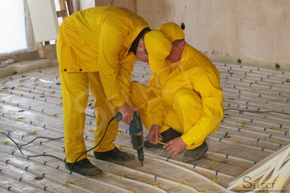 Installation of floor heating in a country house on the second floor
