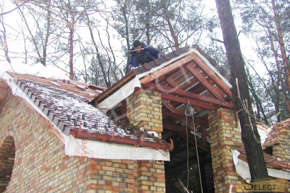 Photo of roof covering with tiles