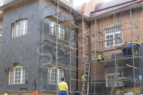 Photos of molar work on the facade of the villa