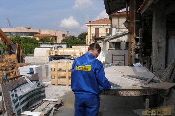 Quality control of production of tiles from natural marble in Italy