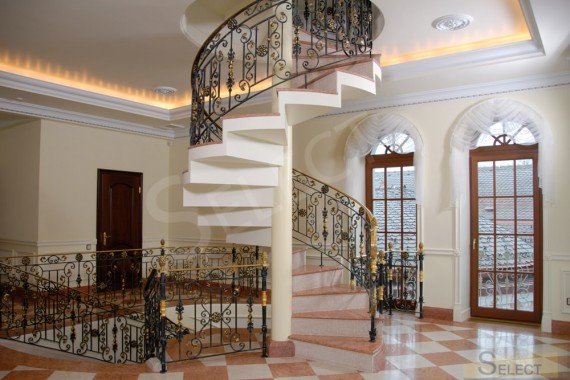 Photo of a wrought-iron spiral staircase - Robers in the gallery at the villa