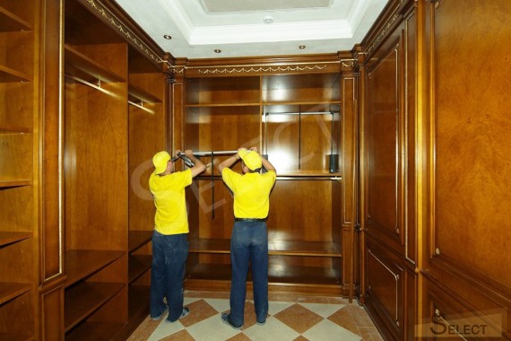 Photo of the built-in wardrobe installation. Dressing room program and wall panels (special order) - Ezio Bellotti