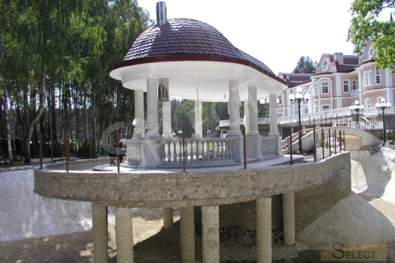 Completed construction of a gazebo at the end of work on the pond. Photo